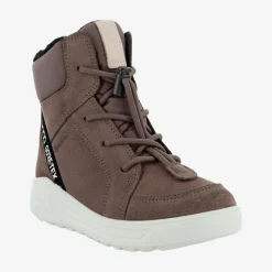 Urban snowboarder mid-cut
