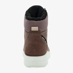 Urban snowboarder mid-cut