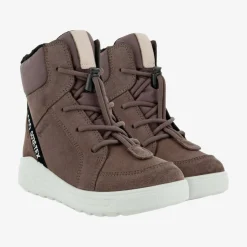Urban snowboarder mid-cut